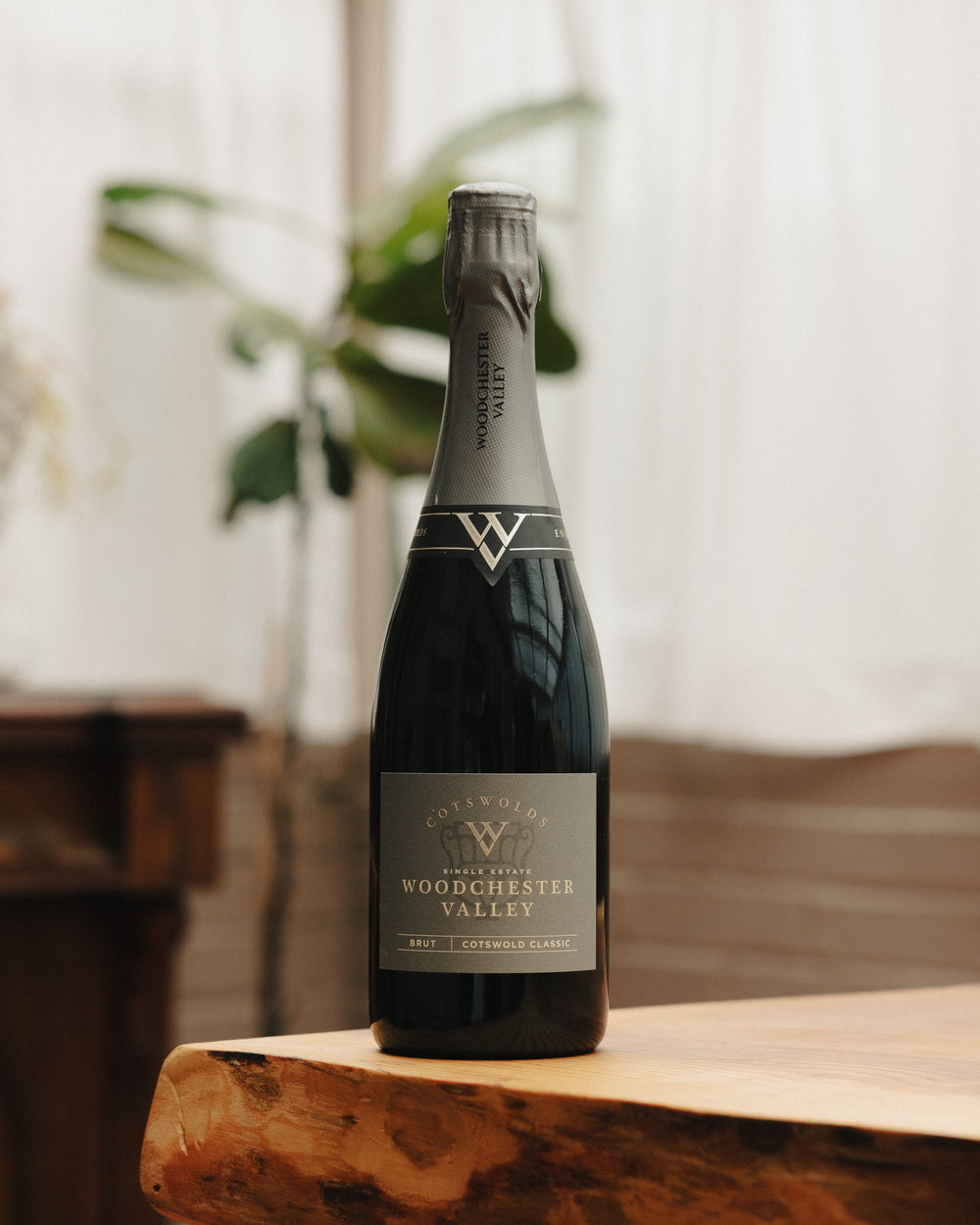 Woodchester Valley sparkling wine bottle with label standing upright
