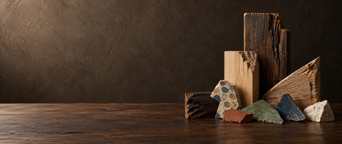 Conceptual illustration of reclaimed-material offcuts on a dark tabletop; not Stratum products.