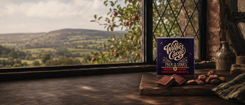 Art-directed Herefordshire orchard landscape with a Willie’s Cacao Milk of the Stars bar on the right.